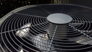 Closeup of an AC unit's blade fan