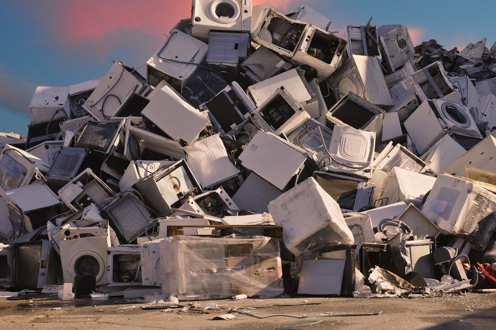 Pile of old electrical appliances, scrap photographed at the end of the day